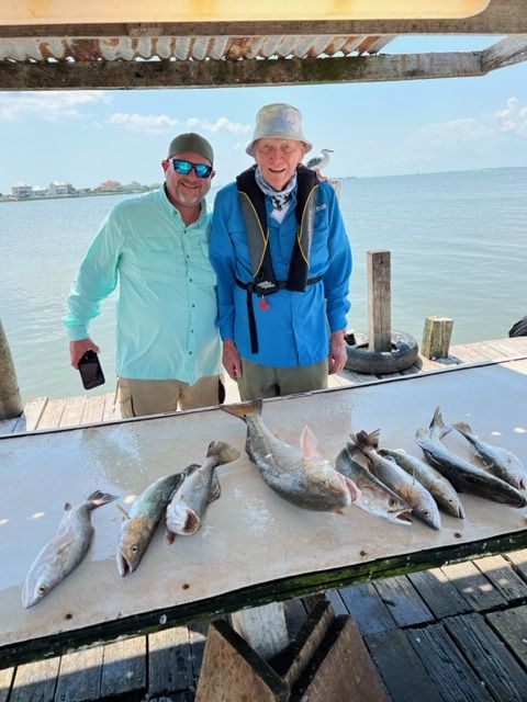 A picture of Dave, smiling during a fishing trip with his AccuTRANS colleagues.